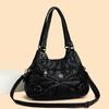 Shoulder Leather Locomotive Bag New Large-capacity Women's Bag Atmospheric Commuter Bag Woven Leather Button Pleated Bag