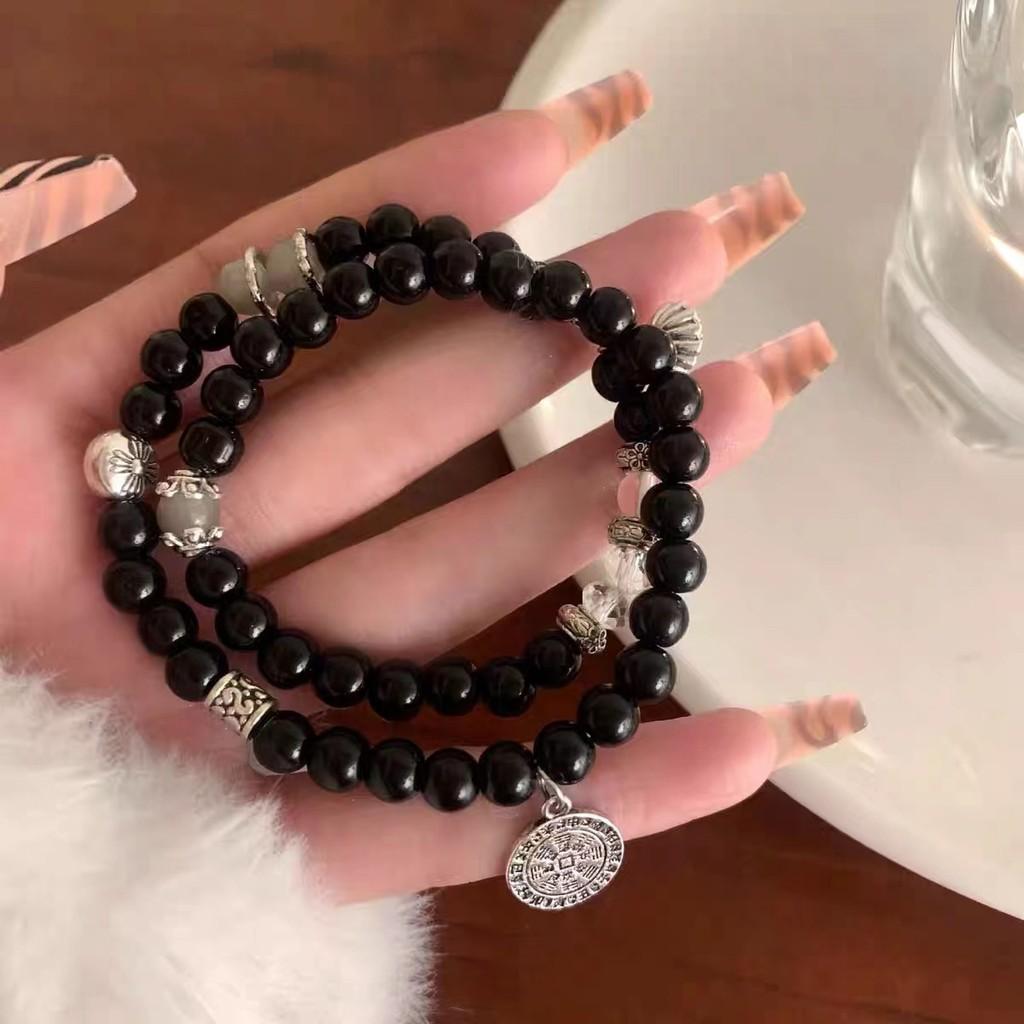 Sophisticated Black Beaded Bracelet For Women With Unique Design Elements