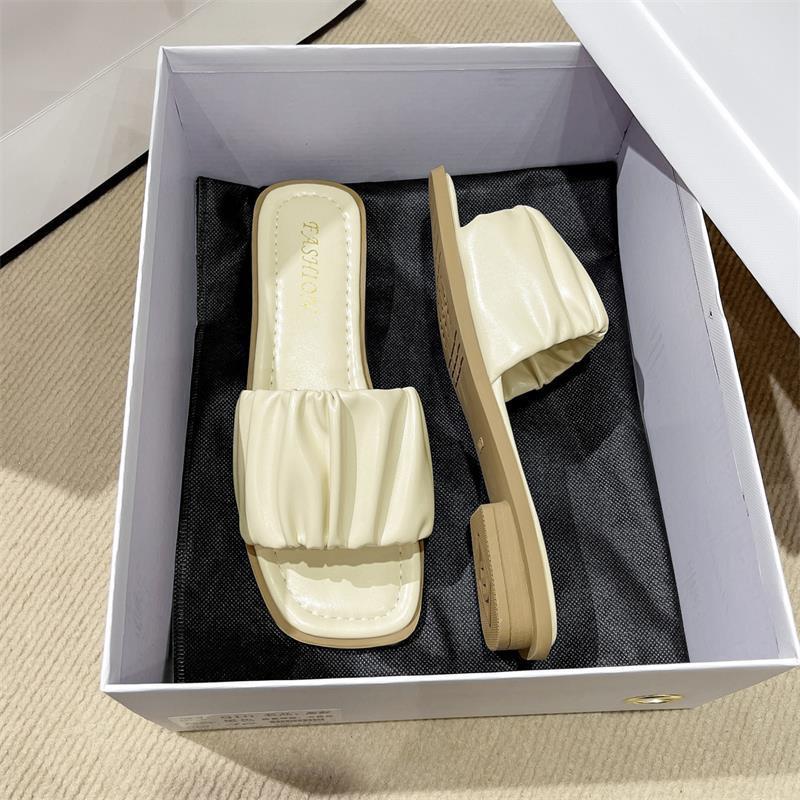 Cool slippers women's summer 2025 new Korean version pleated fashion one-word drag square head flat bottom low heel outer wear beach shoes women