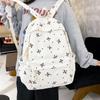 Školní batoh japonský mašle batoh malý svěží potisk vysokoškolský styl vysokoškolák školní batoh dívka Harajuku velkokapacitní batoh