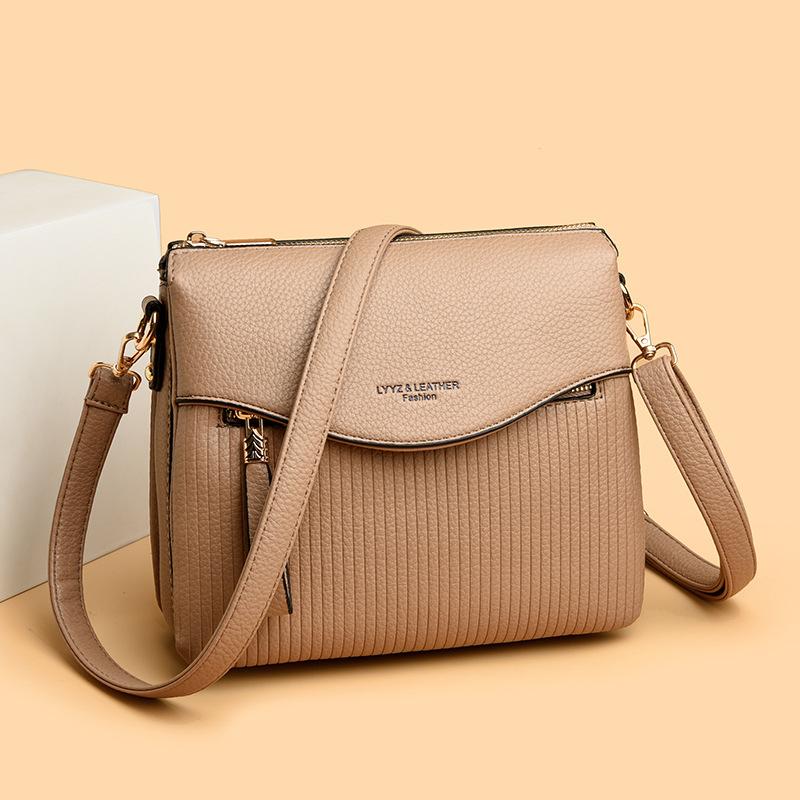 Eine Nischendesign Kleine Quadratische Tasche, Eine Modische Einzel-Schultertasche für Mütter mittleren Alters, und Eine Lässige Umhängetasche