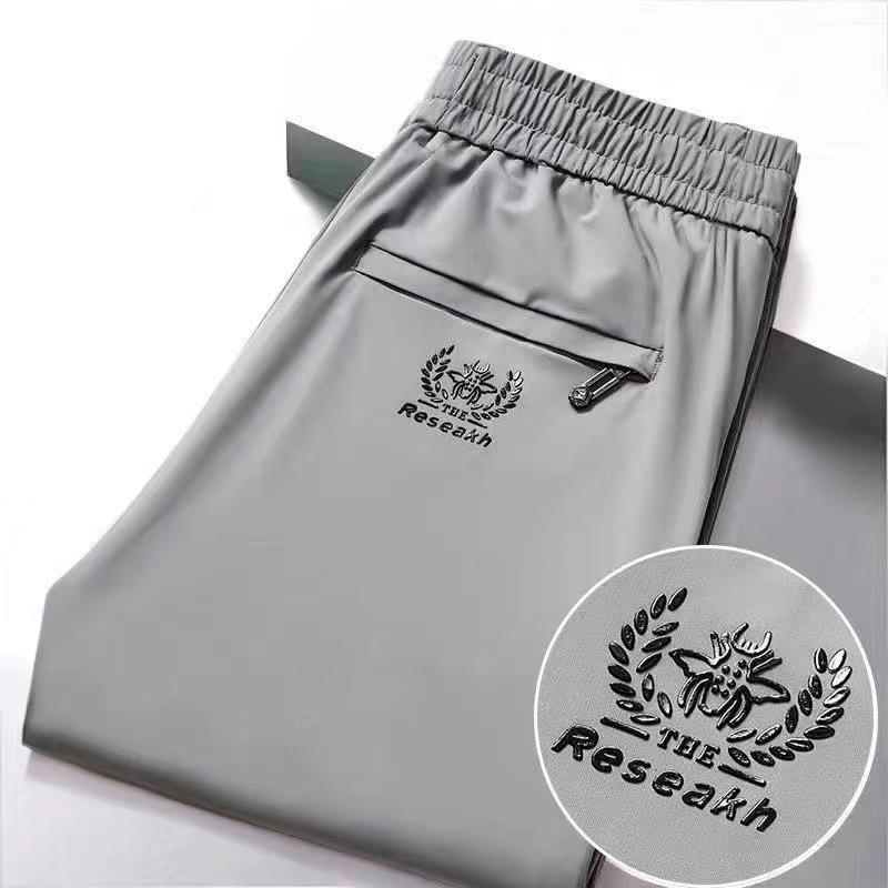 

Мужские повседневные брюки из эластичного шелка Ice Silk — удобная эластичная резинка на талии, свободные, тонкие, прямого кроя, подходят для мужчин среднего возраста и молодых людей. M светло-серый