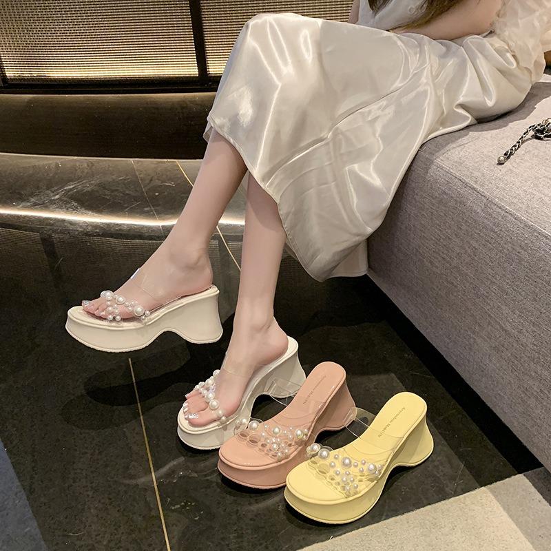 Summer new one-word strap transparent sexy high-heeled slippers women's waterproof table pearl slope heel cool slippers fashion