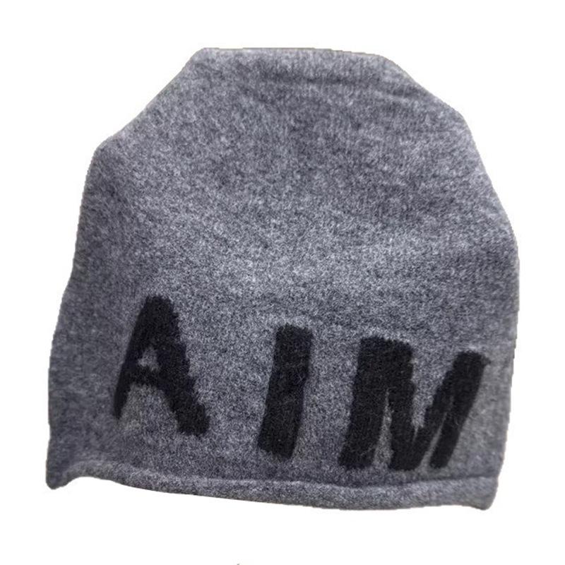 Contrasting large letters Elastic thin age reducing pile hat Children autumn and winter warm versatile Internet celebrity wool hat Knitted hat