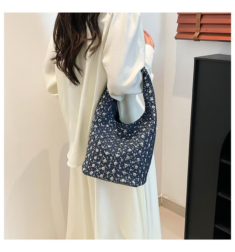 Personality trend rivet bucket bag women 2025 new high-end fashion punk underarm shoulder messenger bag
