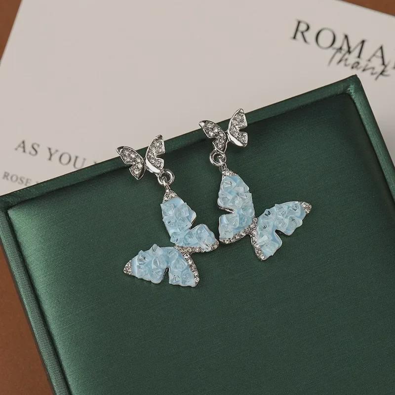Silver Needle Crystal Butterfly Tassel Earrings with Pearls - Elegant, Nature-Inspired Jewelry for Women.