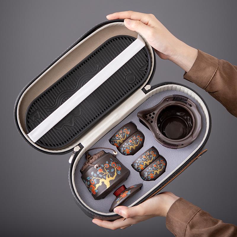 

Purple sand hand-held pot, persimmon Ruyi travel tea set, one pot and four cups of tea cans, dry tea trays, business gifts