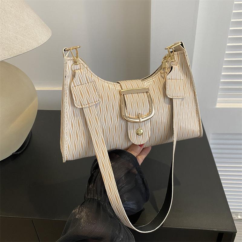 

Высококачественная нишевая дизайнерская сумка женская 2024 новая универсальная модная сумка через плечо подмышкой популярная сумка-багет белый