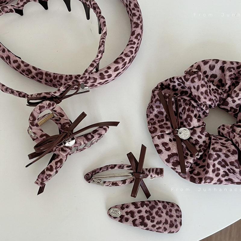 

Pink Leopard Print Bow Leather Hair Clip Set: Large Scrunchie, High-End Bang Clip, Shark Clip, & Headband.