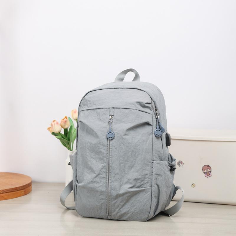 Schoolbag schoolbag women's 1011 simple and lightweight student solid color early autumn new travel backpack trendy high value backpack waterproof