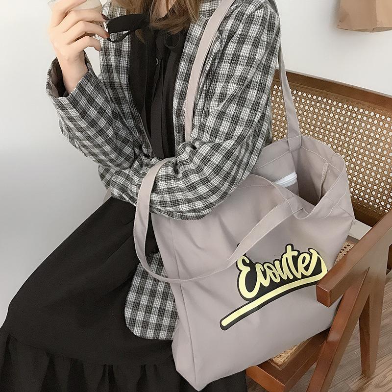 

Autumn and winter new versatile college style canvas bag women s bag candy color casual shoulder bag серый