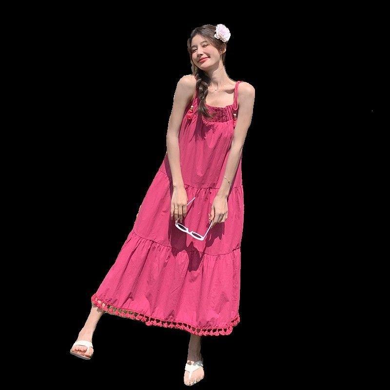 Niche design fringed suspender dress women's summer seaside vacation gentle wind loose and thin temperament long skirt