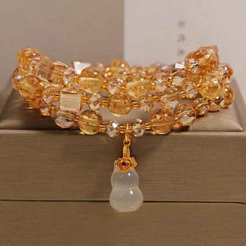 Golden Luminous Crystal Bracelet: Multi-layer Design with Chalcedony Gourd Pendant for Women, Elegant Light Luxury Style.