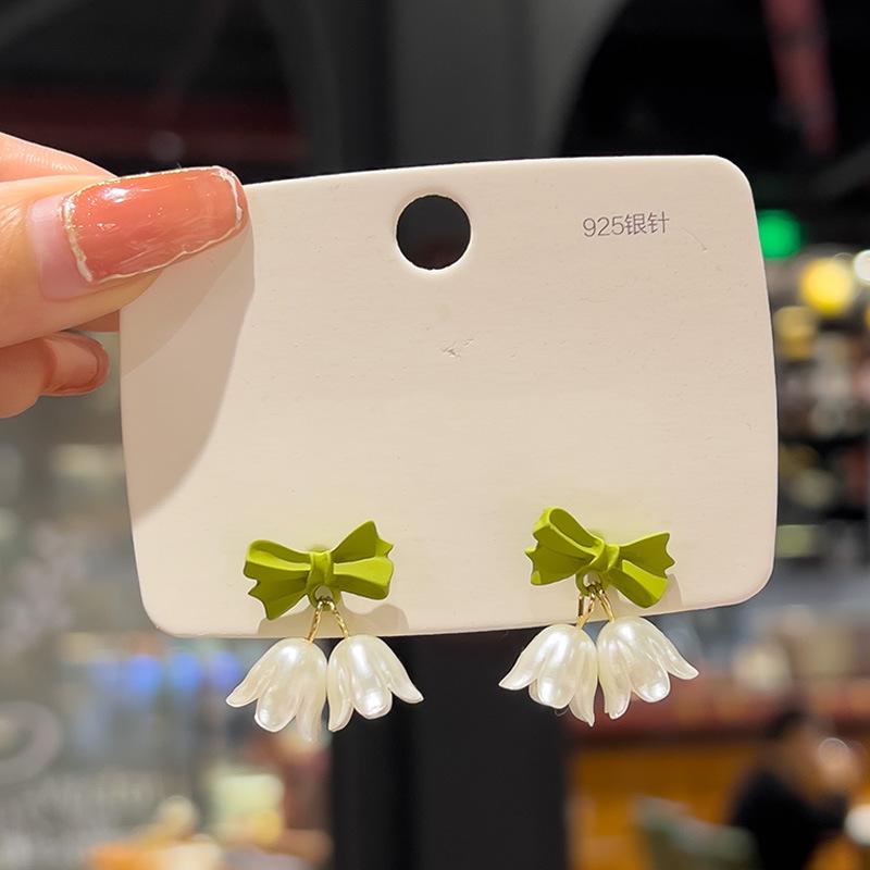 

Sweet Girl Earrings Korean Version Bell Orchid Tulip Flower Gentle Bow Knot Sen Girl Temperament Versatile Bride Earrings Pearl