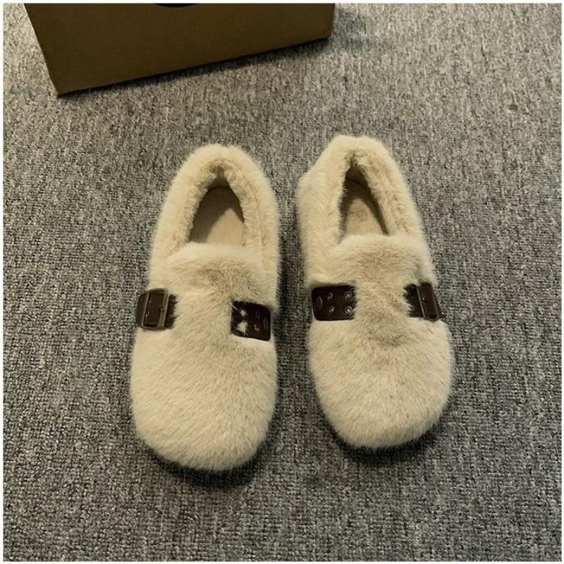 A Pair of Fleece and Thickened Cotton Shoes for A Lazy Woman To Wear for Warmth and Versatility