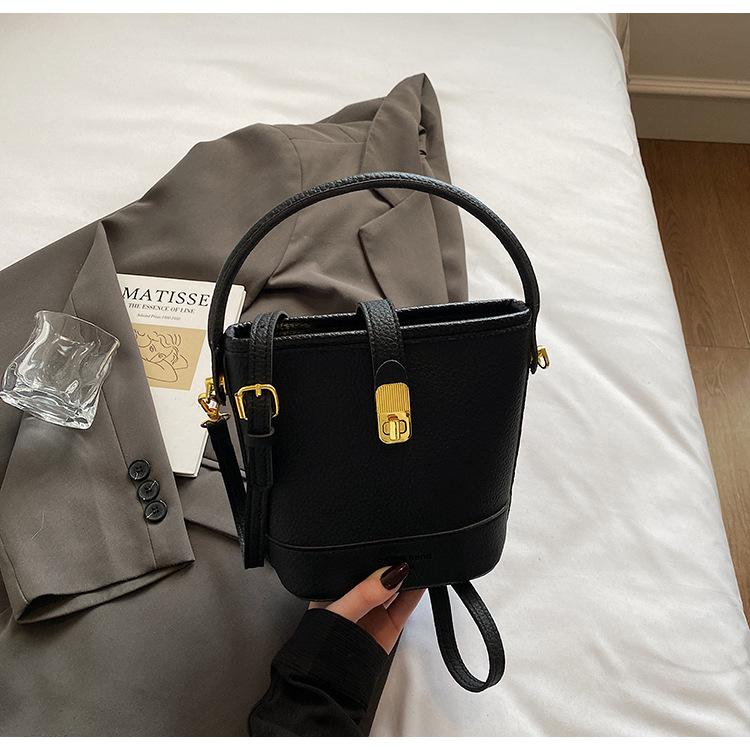 High-end niche contrasting color small bucket bag women's 2025 new Korean version fashion one-shoulder portable messenger bag