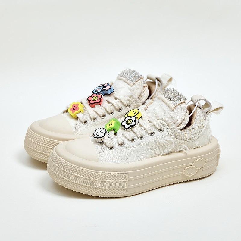 Zhao Ruth's new niche thick-soled pendant smiley face shoes of the same sports and leisure shoes increase the height of canvas shoes for women