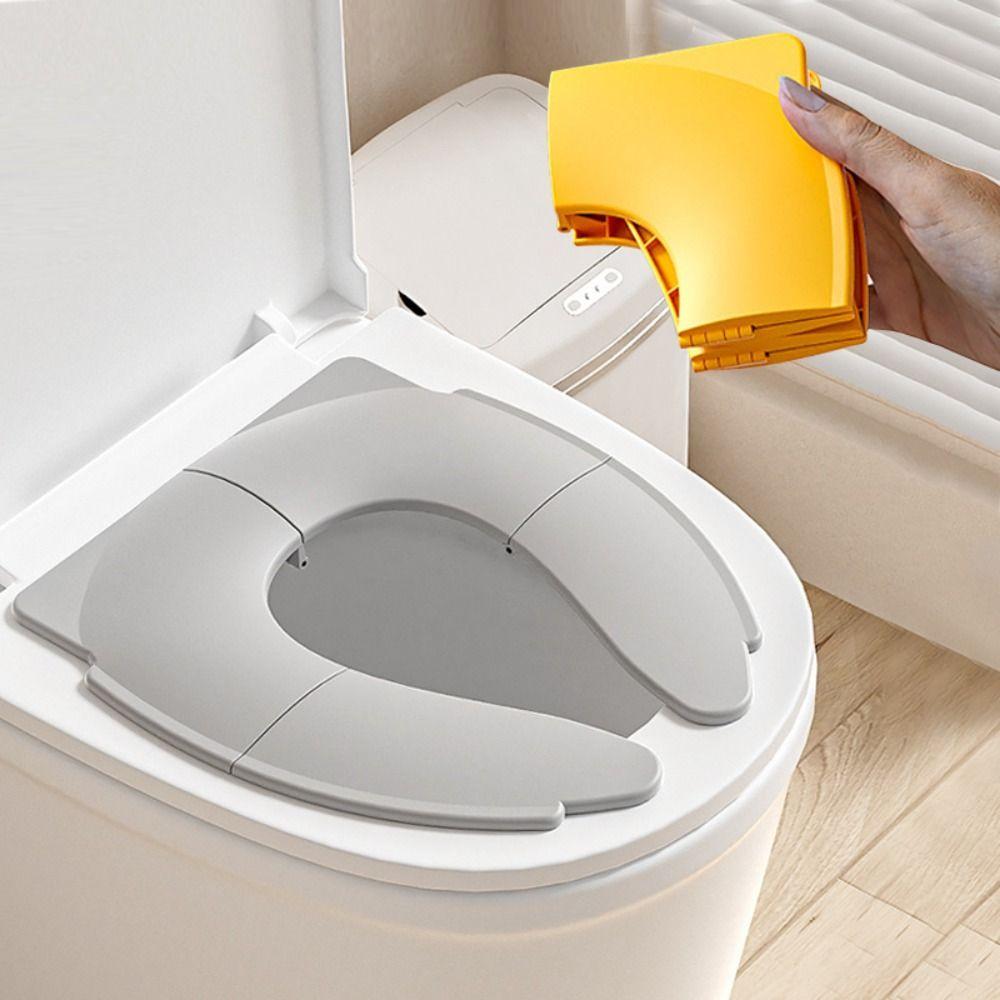 Einfarbiges Baby-Reise-Toilettensitz-Kissen faltbar für Kinder Urinalkissen für 0-7 Jahre