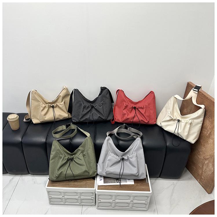 Korean Style Plaid Dumpling Bag: Women's 2026 Versatile Drawstring Crossbody
