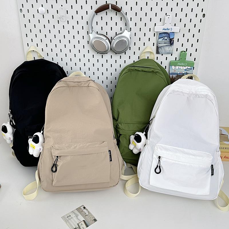 Light backpack Korean version lazy style schoolbag female junior high school students casual simple large capacity travel backpack