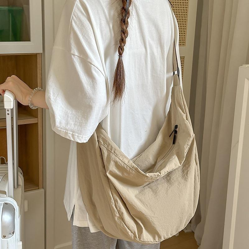 Lazy wind canvas bag new simple dumpling bag versatile women's shoulder bag large capacity commuter messenger bag