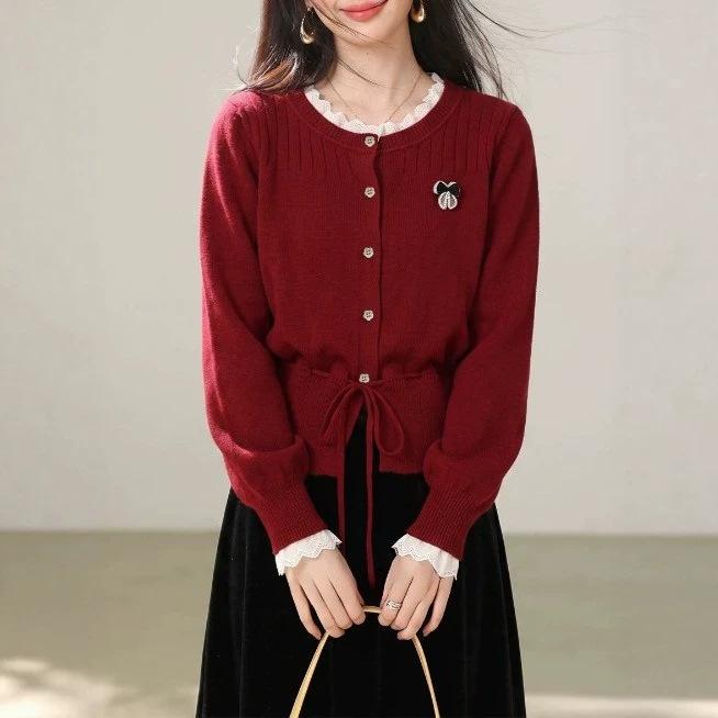 Gentle wind simple long-sleeved sweater women's autumn and winter explosion design sense waist drawstring thin knitted sweater versatile