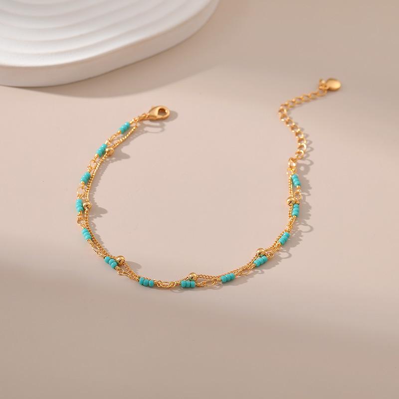 Gold Plated Double Layer Turquoise Color Seed Bead Bracelet With Extension Chain