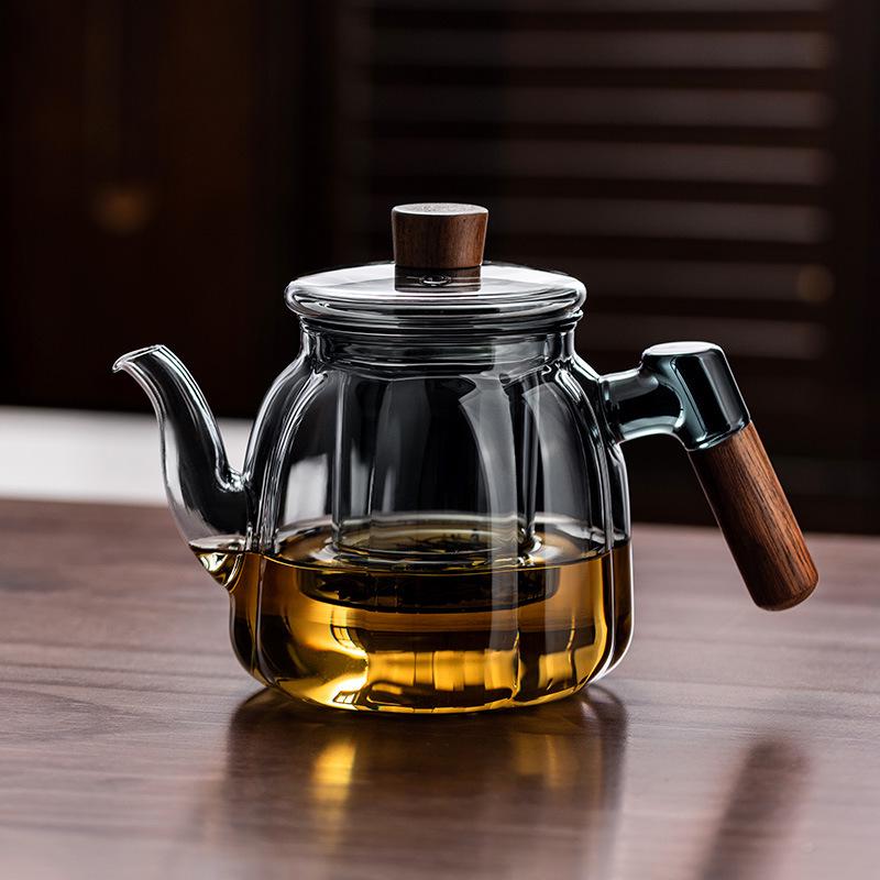 High-Temperature Resistant Glass Teapot for Boiling Water and Brewing Tea with Special Tea Separation Feature.