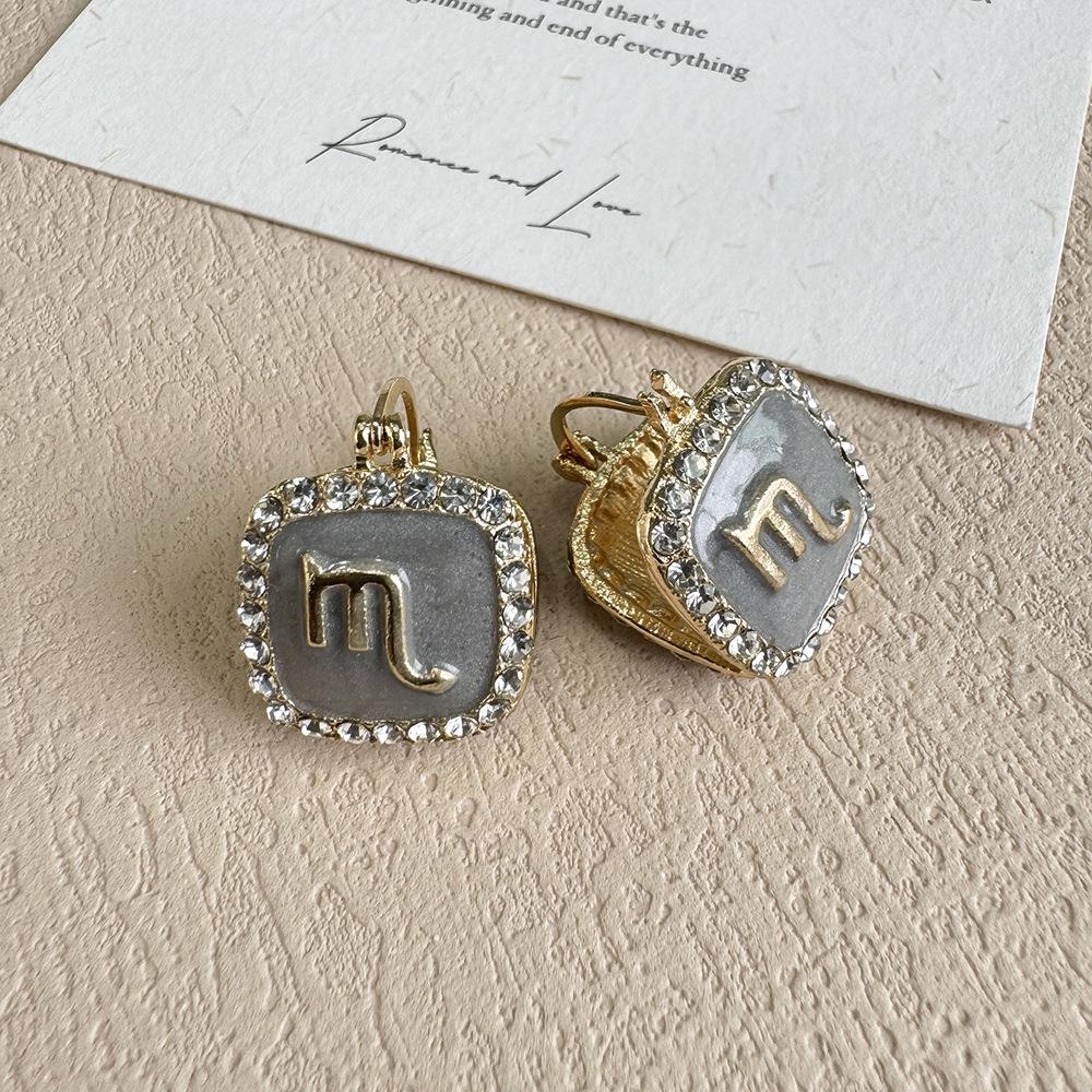 Light Luxury High-End Geometric Constellation Earrings Niche Design Oil-Dripping Ear Buckle French Retro Light Luxury Temperament Earrings Women
