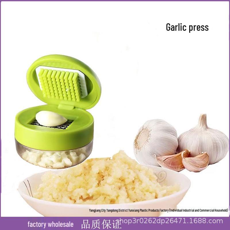 

Manual Garlic Press and Mincer with Peeler and Cutter зелений