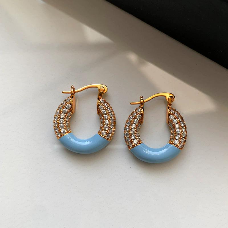 

European and American zircon enamel ear buckle women s light luxury niche design sense high-grade unique earrings temperament earrings new models