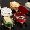 European Style Mini Jewelry Storage Box Organizer Portable Ellipsoid Inlaid Gem Alloy Necklace Ring Storage Dresser Display Case