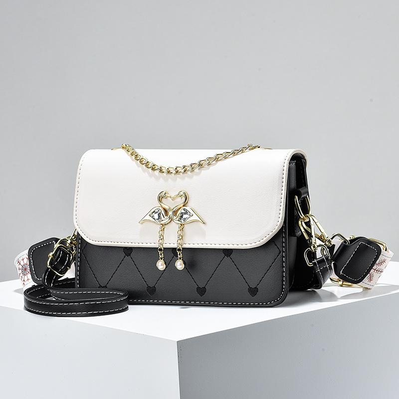 

Нова весняно-літня універсальна модна сумка на плече через плече. Маленька квадратна сумка. Модна темпераментна сумка, щоб відправити дівчині 21*8*14cm чорний