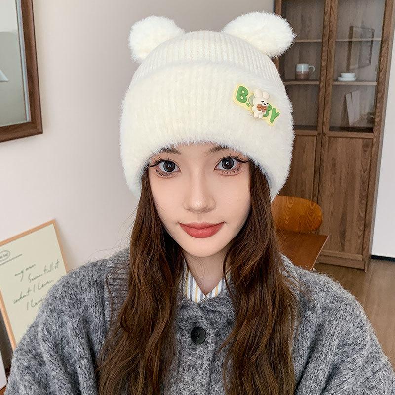 

Letter label knitted warm hat women autumn and winter cycling sports cover stacking hat outdoor rabbit ear hat Cold and warm, elastic