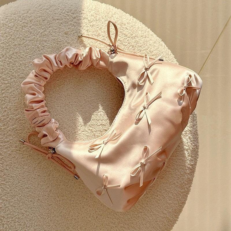 Spring new armpit bag niche pleated bow women's hand bag shoulder cloud bag