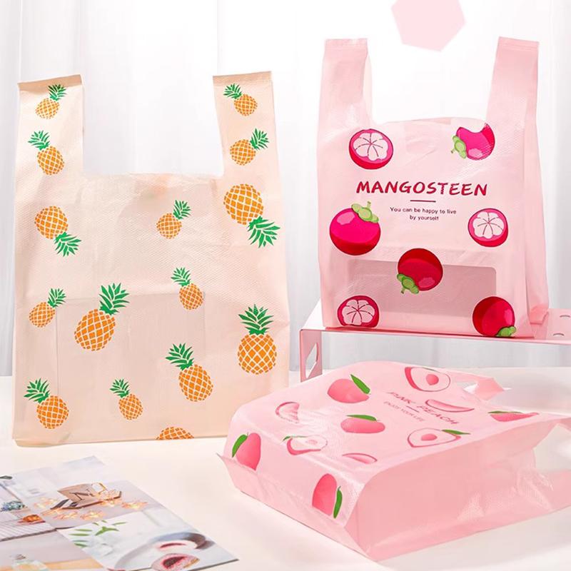 50pcs Disposable Peach Fruit Pattern Hand Bag Packaged Flower Takeaway Bags Snack Double Ear Plastic Vest Handle Shopping Pouch