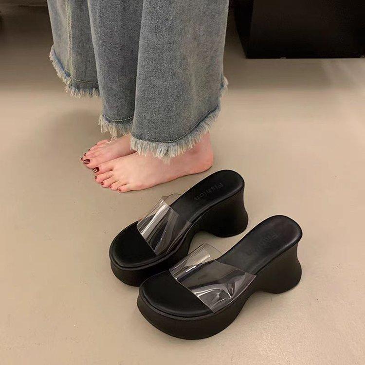 sponge cake thick bottom slope heel cool slippers women's summer wear fashion 2025 new high-end fairy wind transparent one-word drag