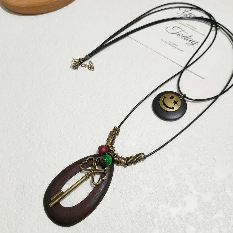 

New Chinese Zen ancient bronze leaf sweater chain Bohemian ethnic style double-layered long necklace woman