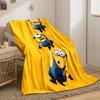 Three Minions in blue overalls hanging from each other on a yellow background. for all seasons blanket lunch break throw gift