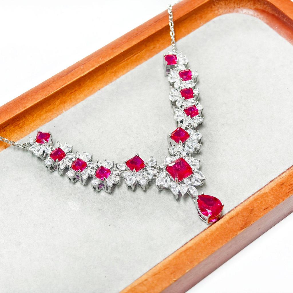 Gessen Jewelry: Elegant Red Zirconia Earrings, Ring & Pendant Set