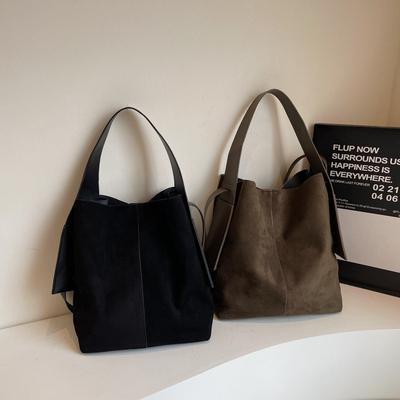 Herfst en winter mode tassen dames nieuwe trendy en populaire effen kleur schoudertassen casual grote capaciteit forens tote bags