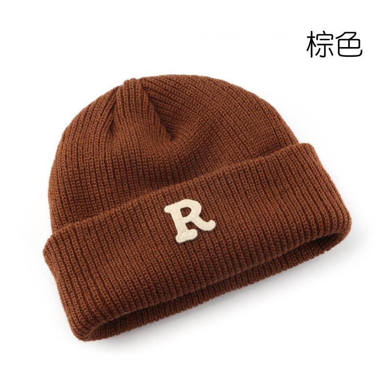 Women's Solid Color Letter Print R Rolled brim knitted hat for outdoor cycling, providing warmth, cold protection, and ear coverage