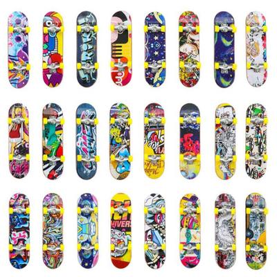 1Pc Bambini carini Mini Fingerboard Skate Boarding Regali Festa Giocattolo Casuale