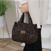 Largecapacity fashion niche design tote bag women's casual handbag Korean version of foreignstyle thermal insulation leopard print
