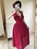 Luxuriöses plissiertes High-Waist-Neckholder-Netzkleid mit offenem Rücken
