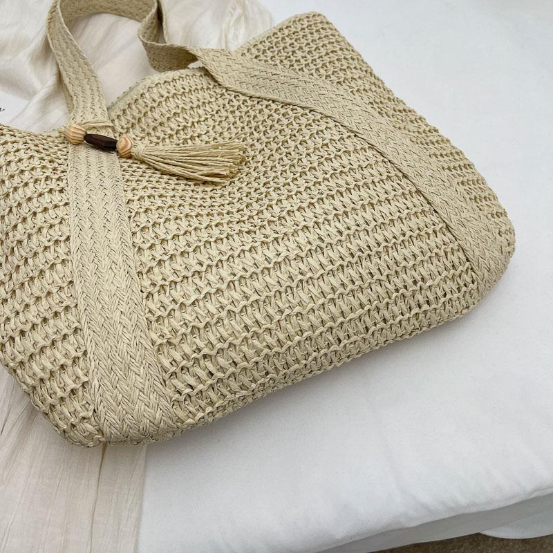 Handwoven Straw Tote Bag Women's Summer Beach Bag with Tassel Detail and Lightweight Design