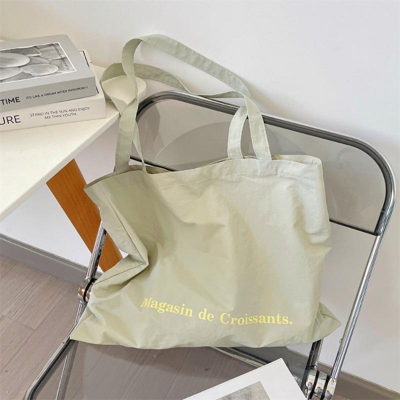 

Large capacity canvas tote bag women s bag student class shoulder bag printed cloth bag simple schoolbag світло-сірий колір