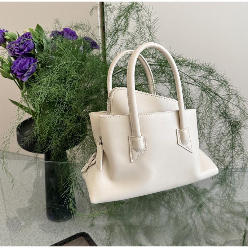 Minimalist Irregular Handbag With Multiple Pockets Smooth Leather Texture Women Versatile Crossbody Or Tote Use Commute Mini Bag