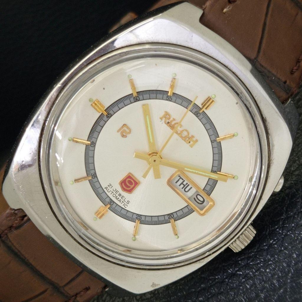 

ВИНТАЖНЫЕ АВТОМАТИЧЕСКИЕ ЧАСЫ RICOH R31 ЯПОНИЯ МУЖСКИЕ СЕРЕБРИСТЫЙ ЦИФЕРБЛАТ a701922-5 R207-a701922