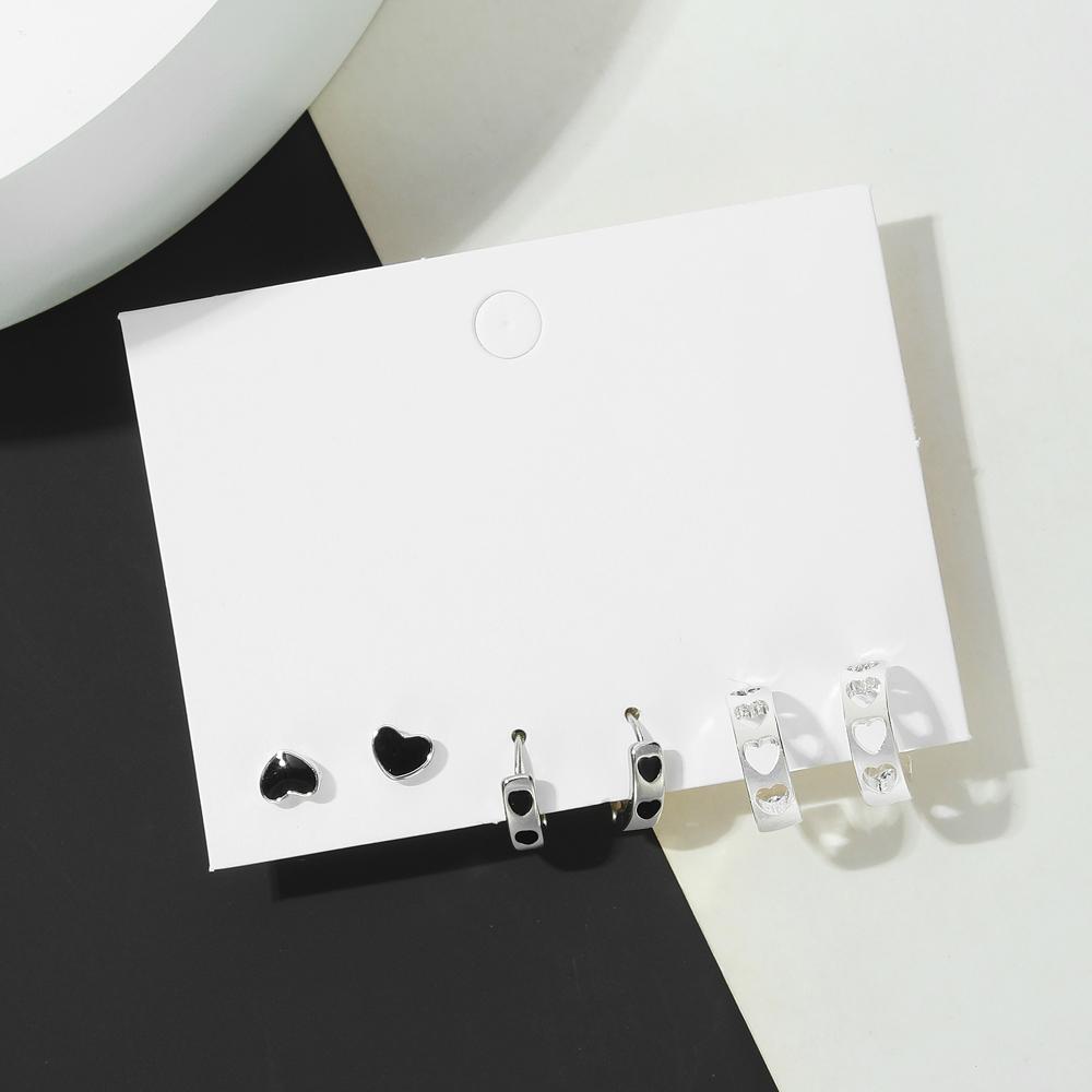 Boucles d'oreilles simples d'amour Mode Femme Ensemble de boucles d'oreilles Écossais noir et blanc Creux Élégant Exquis Bijoux Boucles d'oreilles Tempérament Charme Boucles d'oreilles fille